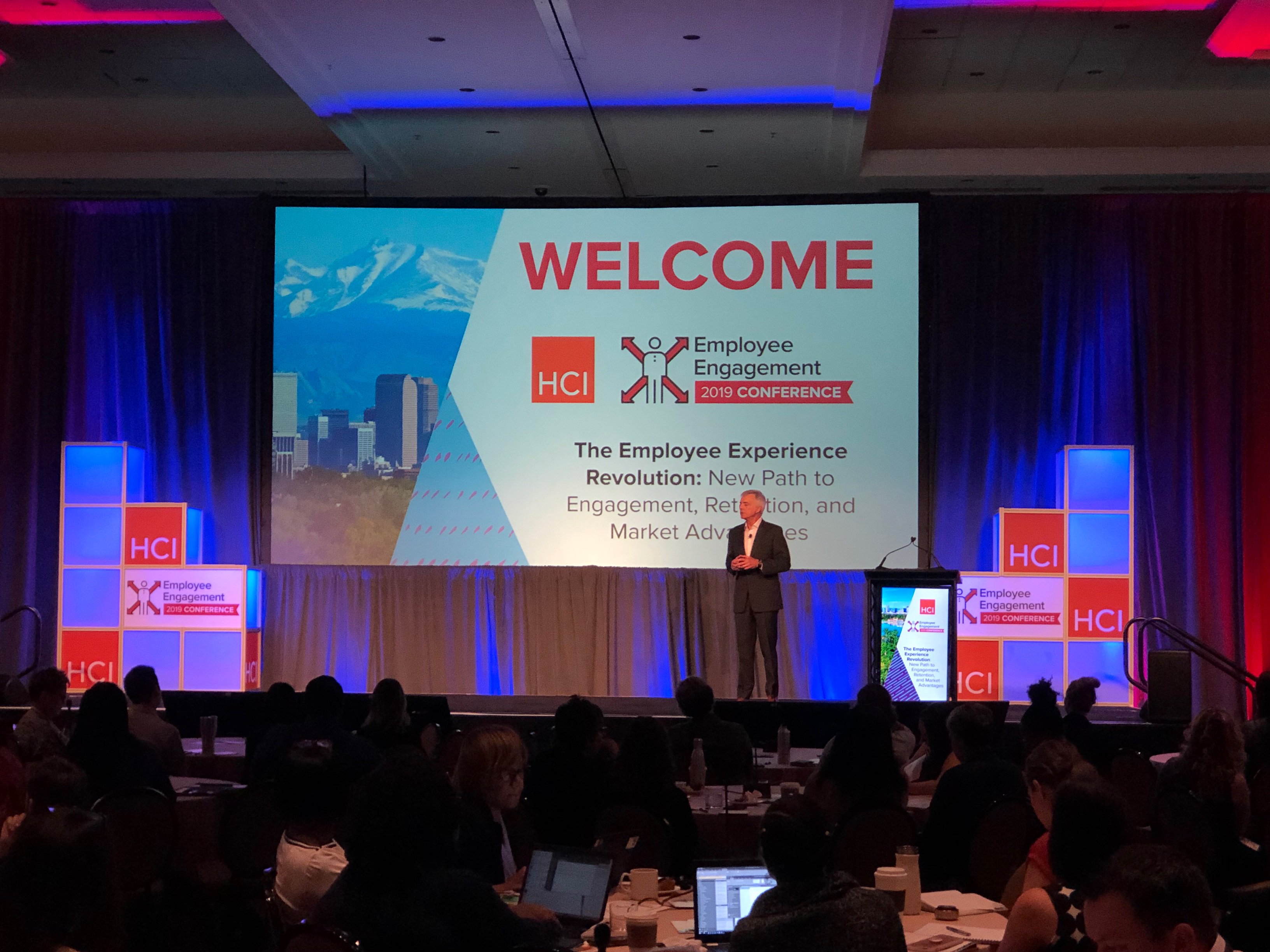 Chuck Feltz - on stage giving 2019 Employee Engagement presentation